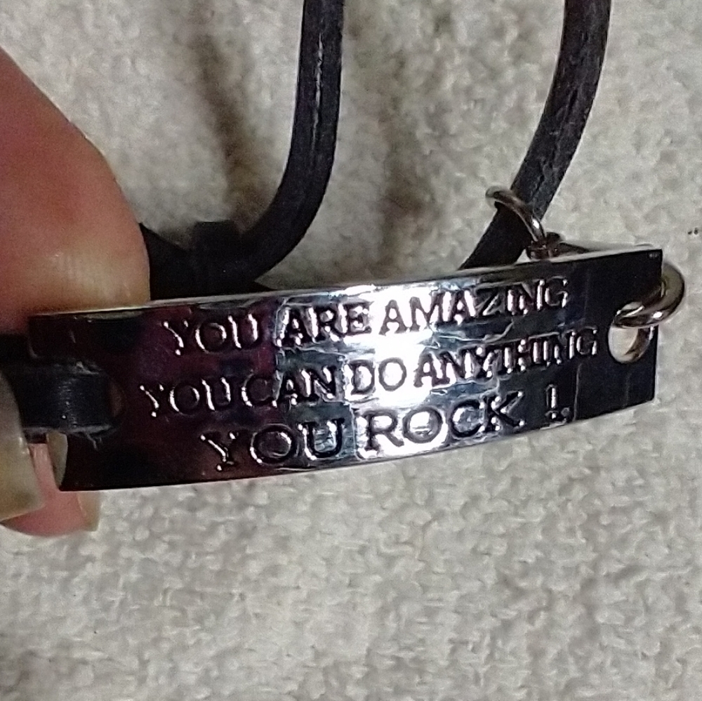 Silvertone black leather adjustable bracelet